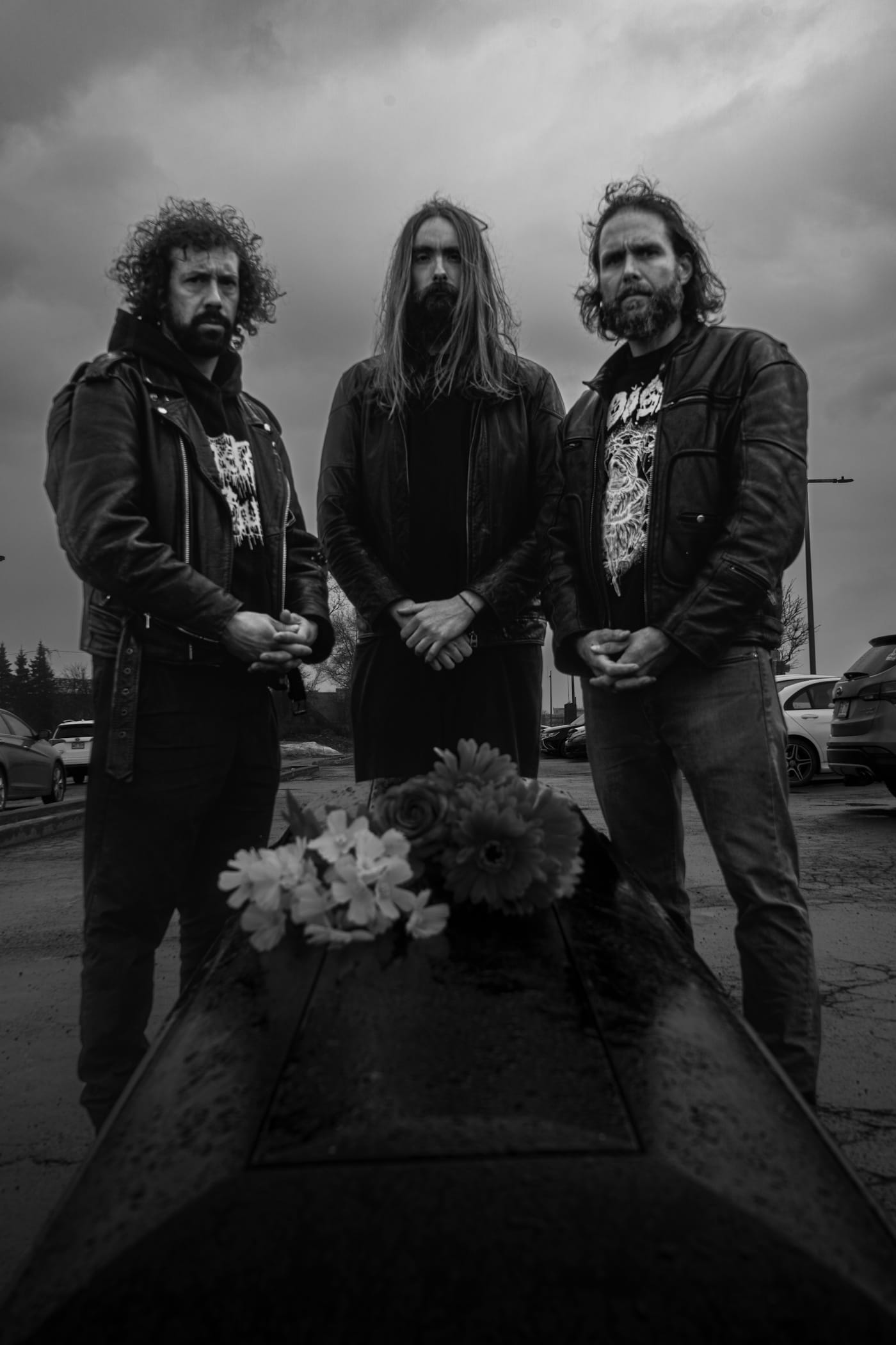 SEUM, the bass-only Montreal sludge trio, tell the full story behind new album "Parking Life" 1 SEUM