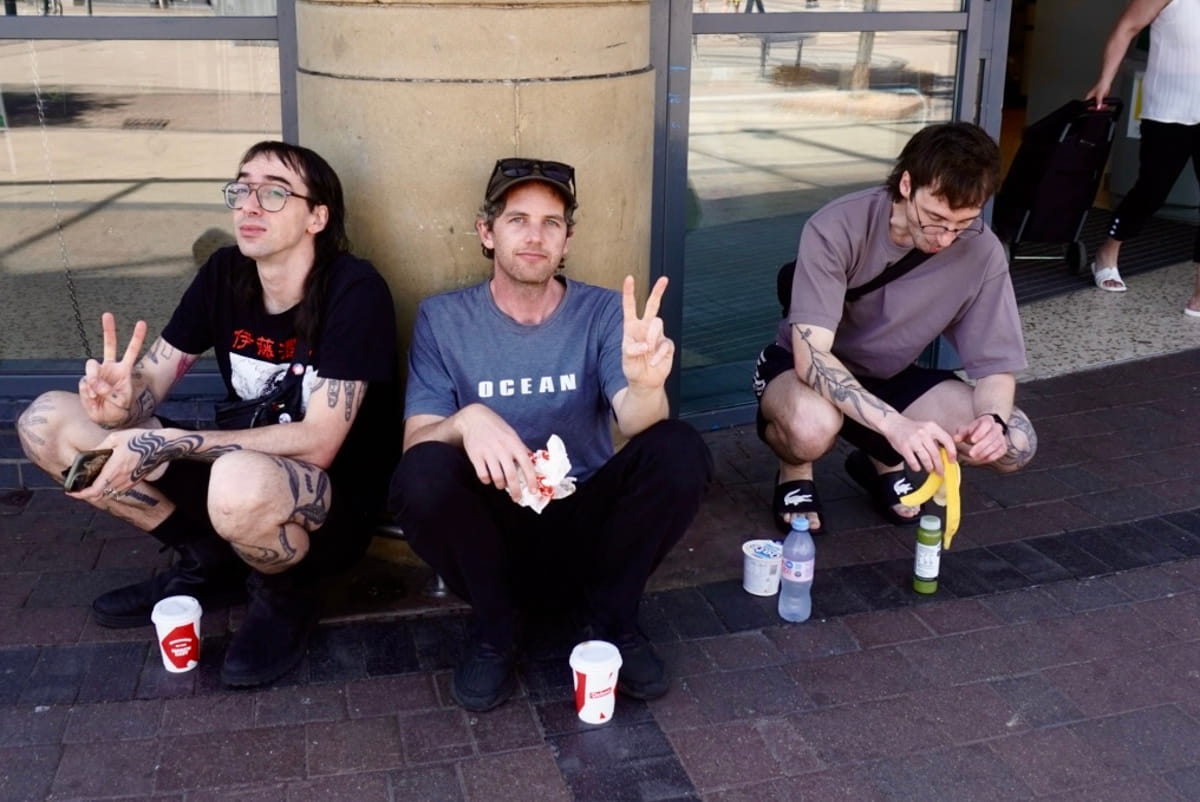 Australian synth post punks SCREENSAVER send a mid-tour dispatch from Europe, reflect on community, landlords, and why creative expression matters 7 Jonnine Dorian and Roadie Hugh at a pitstop somewhere