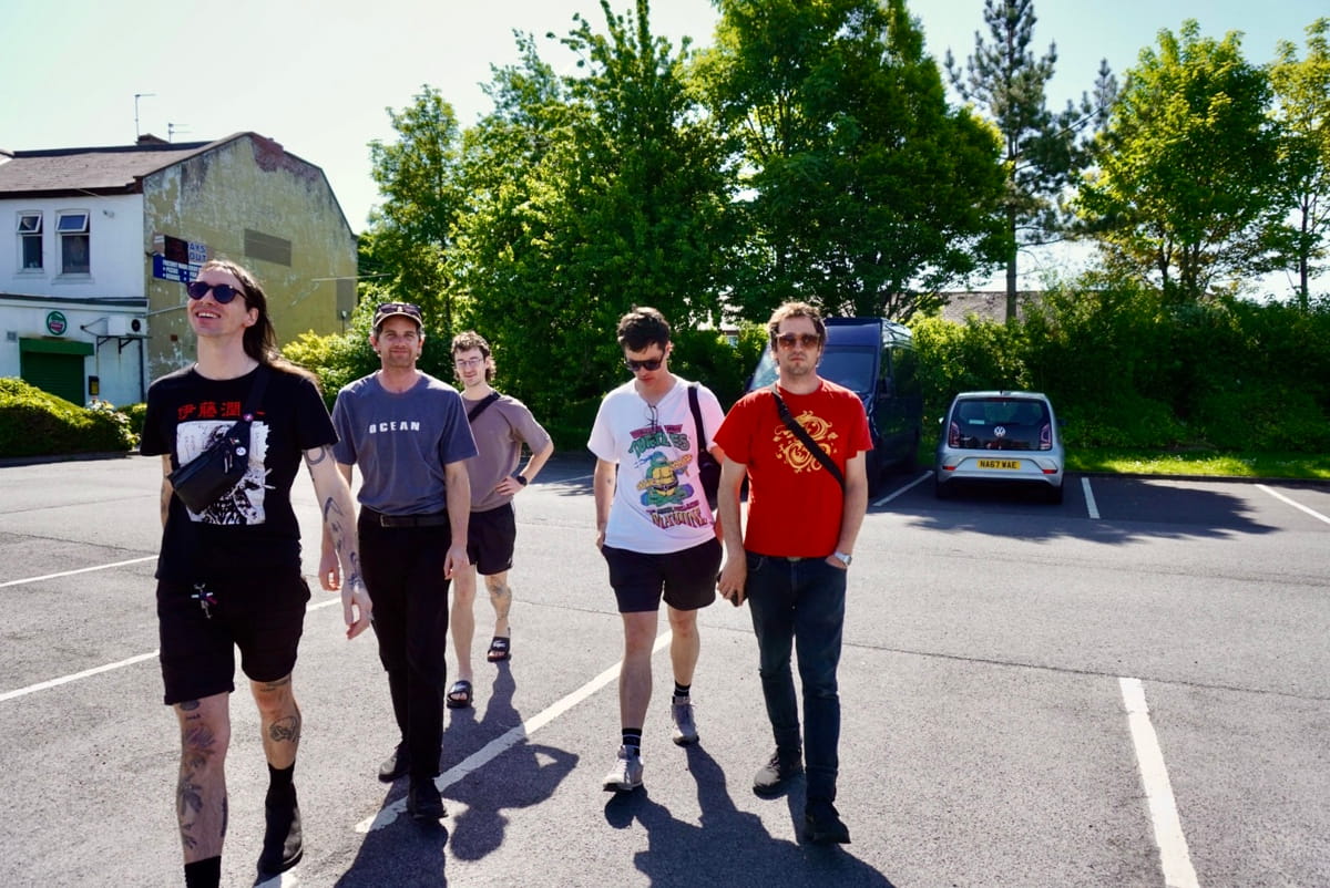 Australian synth post punks SCREENSAVER send a mid-tour dispatch from Europe, reflect on community, landlords, and why creative expression matters 13 Pitt stop somewhere in the UK