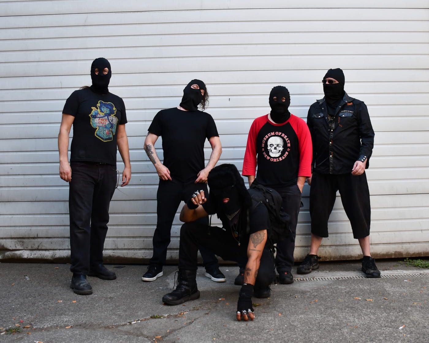 Masked Seattle pack PUNKTUALS clock work, death and survivor guilt into "Hourly Rage", "Dog Bite" premiering now! 2 PUNKTUALS by Gerard Garvey