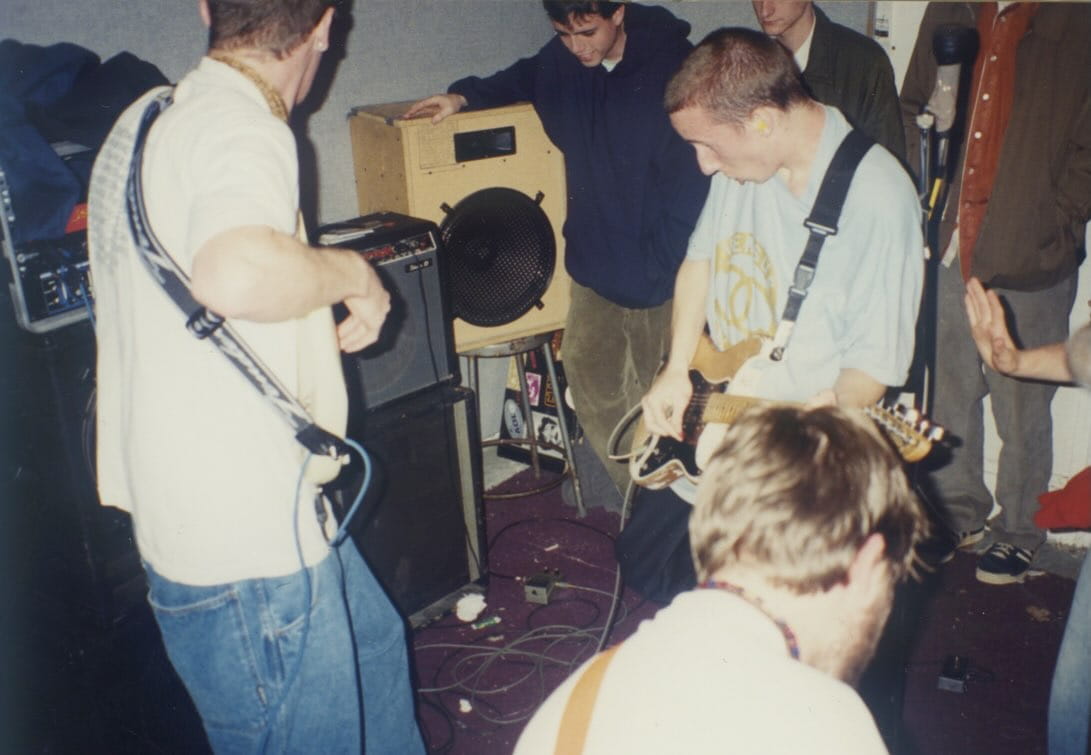 Serotonin return after 23 years, bring their stop-start emo and post hardcore back into motion on "The Price" 4 "Summer 1996 at the I DEFY house in Atlanta. Our first out of town show. With Ex-Ignota, Rain Child, and One Way. No idea who took the pictures. Scott MC in the blue hoodie, who co-released While I Breathe I Hope 7”, and released our first LP (s/t) on his label Concurrent. A pivotal and fun time."
