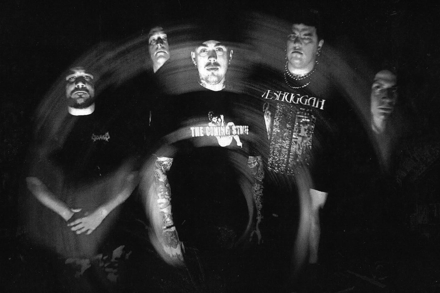 EROSION CHOIR unlocks twisted, unhinged metalcore madness with "Faith Based Flagellation Contract" video 1 Erosion Choir, by Zac Pinney